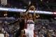 Feb 18, 2014; Washington, DC, USA; Washington Wizards small forward Trevor Ariza (1) shoots the ball as Toronto Raptors small forward Terrence Ross (31) defends in the first quarter at Verizon Center. Mandatory Credit: Geoff Burke-USA TODAY Sports