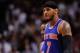 Apr 6, 2014; Miami, FL, USA; New York Knicks forward Carmelo Anthony (7) walks back to the bench during the second half against the Miami Heat at American Airlines Arena. Miami won 102-91. Mandatory Credit: Steve Mitchell-USA TODAY Sports