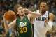 DALLAS, TX - FEBRUARY 07: Gordon Hayward #20 of the Utah Jazz dribbles the ball past Shawn Marion #0 of the Dallas Mavericks at American Airlines Center on February 7, 2014 in Dallas, Texas. NOTE TO USER: User expressly acknowledges and agrees that, by