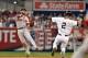 Jun 29, 2014; Bronx, NY, USA; Boston Red Sox second baseman Dustin Pedroia (15) gets the force out on New York Yankees shortstop Derek Jeter (2) and throws out center fielder Jacoby Ellsbury (22) (not pictured) during the first inning at Yankee Stadium. M