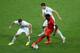 SALVADOR, BRAZIL - JULY 01: Romelu Lukaku of Belgium controls the ball as Matt Besler (R) and Omar Gonzalez of the United States give chase during the 2014 FIFA World Cup Brazil Round of 16 match between Belgium and the United States at Arena Fonte Nova