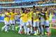 BELO HORIZONTE, BRAZIL - JUNE 28: David Luiz of Brazil celebrates scoring his team's first goal with teammates during the 2014 FIFA World Cup Brazil round of 16 match between Brazil and Chile at Estadio Mineirao on June 28, 2014 in Belo Horizonte, Brazil