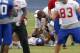 May 22, 2013; East Rutherford, NJ, USA; New York Giants fullback Henry Hynoski (45) is checked on by athletic trainers after an injury to his knee during the New York Giants organized team activities at the Giants Timex Performance Center. Mandatory Credi