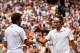 LONDON, ENGLAND - JULY 02: Roger Federer of Switzerland shakes hands with Stan Wawrinka of Switzerland after their Gentlemen's Singles quarter-final match on day nine of the Wimbledon Lawn Tennis Championships at the All England Lawn Tennis and Croquet C