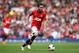MANCHESTER, ENGLAND - MAY 03: Juan Mata of Manchester United runs with the ball during the Barclays Premier League match between Manchester United and Sunderland at Old Trafford on May 3, 2014 in Manchester, England. (Photo by Shaun Botterill/Getty Imag