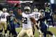 SEATTLE, WA - JANUARY 11: Running back Mark Ingram #22 of the New Orleans Saints celebrates after scoring on a two-point conversion in the fourth quarter against the Seattle Seahawks during the NFC Divisional Playoff Game at CenturyLink Field on January