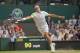 Jul 2, 2014; London, United Kingdom; Roger Federer (SUI) in action during his match against Stan Wawrinka (SUI) on day nine of the 2014 Wimbledon Championships at the All England Lawn and Tennis Club. Mandatory Credit: Susan Mullane-USA TODAY Sports