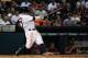 HOUSTON, TX - JUNE 05: Jose Altuve #27 of the Houston Astros hits a two-run double in the eighth inning of their game against the Los Angeles Angels of Anaheim at Minute Maid Park on June 5, 2014 in Houston, Texas. (Photo by Scott Halleran/Getty Images)