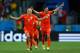 SALVADOR, BRAZIL - JULY 05: Arjen Robben and Robin van Persie of the Netherlands celebrate after defeating Costa Rica in a penalty shootout during the 2014 FIFA World Cup Brazil Quarter Final match between the Netherlands and Costa Rica at Arena Fonte No