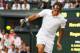 LONDON, ENGLAND - JULY 06: Roger Federer of Switzerland during the Gentlemen's Singles Final match against Novak Djokovic of Serbia on day thirteen of the Wimbledon Lawn Tennis Championships at the All England Lawn Tennis and Croquet Club on July 6, 2014