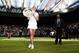 LONDON, ENGLAND - JULY 05: Petra Kvitova of Czech Republic poses with the Venus Rosewater Dish trophy after her victory in the Ladies' Singles final match against Eugenie Bouchard of Canada on day twelve of the Wimbledon Lawn Tennis Championships at the