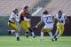 Apr 19, 2014; Los Angeles, CA, USA; Southern California quarterback Jalen Greene (10) moves the ball defended by Southern California inside linebacker Joel Foy (51) during the Southern California Spring Game at Los Angeles Memorial Coliseum. Mandatory Cre