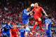 LIVERPOOL, ENGLAND - APRIL 27: Branislav Ivanovic of Chelsea and Martin Skrtel of Liverpool compete for the ball during the Barclays Premier League match between Liverpool and Chelsea at Anfield on April 27, 2014 in Liverpool, England. (Photo by Clive Br
