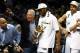 SAN ANTONIO, TX - JUNE 15: Kawhi Leonard #2 of the San Antonio Spurs celebrates with the Bill Russell NBA Finals Most Valuable Player Award and owner Peter Holt after defeating the Miami Heat in Game Five of the 2014 NBA Finals at the AT&T Center on June