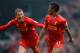 NORWICH, ENGLAND - APRIL 20: Raheem Sterling of Liverpool celebrates scoring the opening goal with Lucas Leiva of Liverpool during the Barclays Premier League match between Norwich City and Liverpool at Carrow Road on April 20, 2014 in Norwich, England.