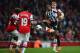 LONDON, ENGLAND - APRIL 28: Loic Remy of Newcastle United controls the ball from Per Mertesacker of Arsenal as Bacary Sagna (L) and Santi Cazorla (2L) look on during the Barclays Premier League match between Arsenal and Newcastle United at Emirates Stadi