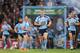 BRISBANE, AUSTRALIA - JULY 09: Paul Gallen of the Blues leads out his team for game three of the State of Origin series between the Queensland Maroons and the New South Wales Blues at Suncorp Stadium on July 9, 2014 in Brisbane, Australia. (Photo by Mar