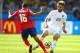 BELO HORIZONTE, BRAZIL - JUNE 24: Cristian Gamboa of Costa Rica challenges Luke Shaw of England during the 2014 FIFA World Cup Brazil Group D match between Costa Rica and England at Estadio Mineirao on June 24, 2014 in Belo Horizonte, Brazil. (Photo by R