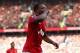 MANCHESTER, ENGLAND - NOVEMBER 03: Patrice Evra of Manchester United celebrates scoring his team's second goal during the Barclays Premier League match between Manchester United and Arsenal at Old Trafford on November 3, 2012 in Manchester, England. (Ph