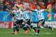 SAO PAULO, BRAZIL - JULY 09: (L-R) Marcos Rojo, Lucas Biglia, Rodrigo Palacio and Sergio Aguero of Argentina celebrate after defeating the Netherlands in a penalty shootout during the 2014 FIFA World Cup Brazil Semi Final match between the Netherlands and