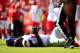 KANSAS CITY, MO - SEPTEMBER 29: Defensive end Jason Pierre-Paul #90 of the New York Giants lies on the ground hurt during the against the Kansas City Chiefs game at Arrowhead Stadium on September 29, 2013 in Kansas City, Missouri. (Photo by Jamie Squire