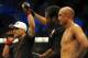 Jul 6, 2014; Las Vegas, NV, USA; Frankie Edgar (red gloves) is named victor over B.J. Penn (blue gloves) following a featherweight bout at Mandalay Bay Events Center. Mandatory Credit: Stephen R. Sylvanie-USA TODAY Sports