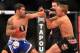 Oct 9, 2013; Barueri, Sao Paulo, Brazil; Raphael Assuncao (blue shorts) fights against TJ Dillashaw (black shorts) during UFC Fight Night 29 at Jose Correa Arena. Mandatory Credit: Jason Silva-USA TODAY Sports