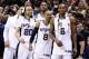 SAN ANTONIO, TX - JUNE 15: Manu Ginobili #20, Patty Mills #8 and Kawhi Leonard #2 of the San Antonio Spurs celebrate on the bench in the closing minutes of Game Five of the 2014 NBA Finals against the Miami Heat at the AT&T Center on June 15, 2014 in San