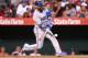 ANAHEIM, CA - JULY 07: Jose Bautista #19 of the Toronto Blue Jays hits a ssacrifice fly to tie the game at 1-1 in the fourth inning against the Los Angeles Angels of Anaheim at Angel Stadium of Anaheim on July 7, 2014 in Anaheim, California. (Photo by S