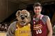 BEREA, OH - OCTOBER 5: Sergey Karasev #10 of the Cleveland Cavaliers poses with mascot Moondog following the annual Wine & Gold Scrimmage at The Rudolph Ursprung Gymnasium on October 5, 2013 in Berea, Ohio. NOTE TO USER: User expressly acknowledges and a