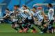SAO PAULO, BRAZIL - JULY 09: Lionel Messi, Pablo Zabaleta, Martin Demichelis, Marcos Rojo, Lucas Biglia, Javier Mascherano, Rodrigo Palacio, Ezequiel Garay and Sergio Aguero of Argentina celebrate defeating the Netherlands in a penalty shootout during th