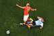SAO PAULO, BRAZIL - JULY 09: Martin Demichelis of Argentina tackles Arjen Robben of the Netherlands during the 2014 FIFA World Cup Brazil Semi Final match between the Netherlands and Argentina at Arena de Sao Paulo on July 9, 2014 in Sao Paulo, Brazil.