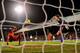 LONDON, ENGLAND - FEBRUARY 12: Simon Mignolet of Liverpool looks on as Kolo Toure of Liverpool scores an own goal during the Barclays Premier League match between Fulham and Liverpool at Craven Cottage on February 12, 2014 in London, England. (Photo by