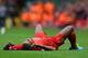 LIVERPOOL, ENGLAND - SEPTEMBER 01: Glen Johnson of Liverpool lies injured during the Barclays Premier League match between Liverpool and Manchester United at Anfield on September 01, 2013 in Liverpool, England. (Photo by Alex Livesey/Getty Images)