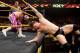 Sin Cara tosses Wesley Blake out of the ring.