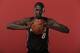 TARRYTOWN, NY - AUGUST 6: James Ennis #8 of the Miami Heat poses for a portrait during the 2013 NBA rookie photo shoot on August 6, 2013 at the Madison Square Garden Training Facility in Tarrytown, New York. NOTE TO USER: User expressly acknowledges and