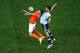 SAO PAULO, BRAZIL - JULY 09: Robin van Persie of the Netherlands and Ezequiel Garay of Argentina compete for the ball during the 2014 FIFA World Cup Brazil Semi Final match between the Netherlands and Argentina at Arena de Sao Paulo on July 9, 2014 in Sa