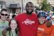AKRON, OH - AUGUST 07: LeBron James with volunteers during his 'King for Kids Bike-a-thon' on August 7, 2010, in Akron, Ohio. NOTE TO USER: User expressly acknowledges and agrees that, by downloading and/or using this Photograph, user is consenting to th