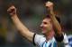 SAO PAULO, BRAZIL - JULY 09: Lionel Messi of Argentina celebrates defeating the Netherlands in a shootout during the 2014 FIFA World Cup Brazil Semi Final match between the Netherlands and Argentina at Arena de Sao Paulo on July 9, 2014 in Sao Paulo, Bra