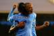 LONDON, ENGLAND - DECEMBER 21: Vincent Kompany of Manchester City celebrates scoring their second goal with Martin Demichelis of Manchester City during the Barclays Premier League match between Fulham and Manchester City at Craven Cottage on December 21,