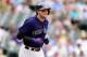 July 6, 2014; Denver, CO, USA; Colorado Rockies shortstop Troy Tulowitzki (2) walks in the eighth inning against the Los Angeles Dodgersat Coors Field. The Dodgers defeated the Rockies 8-2. Mandatory Credit: Ron Chenoy-USA TODAY Sports