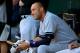 BALTIMORE, MD - JULY 11: Derek Jeter #2 of the New York Yankees looks on from the dugout against the Baltimore Orioles at Oriole Park at Camden Yards on July 11, 2014 in Baltimore, Maryland. (Photo by Rob Carr/Getty Images)