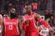 PORTLAND, OR - MAY 2: James Harden #13 and Dwight Howard #12 of the Houston Rockets walk up court in Game Six of the Western Conference Quarterfinals against the Portland Trail Blazers during the 2014 NBA Playoffs on May 2, 2014 at the Moda Center in Por