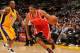 LOS ANGELES - JANUARY 05: Trevor Ariza #1 of the Houston Rockets drives the ball around Kobe Bryant #24 of the Los Angeles Lakers during the game on January 5, 2010 at Staples Center in Los Angeles, California. The Lakers won 88-79. NOTE TO USER: User