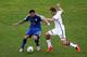 RIO DE JANEIRO, BRAZIL - JULY 13: Ezequiel Lavezzi of Argentina and Miroslav Klose of Germany compete for the ball during the 2014 FIFA World Cup Brazil Final match between Germany and Argentina at Maracana on July 13, 2014 in Rio de Janeiro, Brazil. (P
