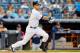 NEW YORK, NY - JUNE 27: Derek Jeter #2 of the New York Yankees gets a first inning base hit against the Boston Red Sox at Yankee Stadium on June 27, 2014 in the Bronx borough of New York City. (Photo by Jim McIsaac/Getty Images)
