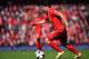 LIVERPOOL, ENGLAND - MAY 11: Luis Suarez of Liverpool in action during the Barclays Premier League match between Liverpool and Newcastle United at Anfield on May 11, 2014 in Liverpool, England. (Photo by Laurence Griffiths/Getty Images)