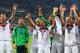 RIO DE JANEIRO, BRAZIL - JULY 13: Mario Goetze of Germany raises the World Cup trophy with teammates Per Mertesacker, Ron-Robert Zieler, Shkodran Mustafi, Roman Weidenfeller, Mats Hummels and Bastian Schweinsteiger during the 2014 FIFA World Cup Brazil F
