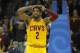 Apr 5, 2014; Cleveland, OH, USA; Cleveland Cavaliers guard Kyrie Irving (2) reacts after missing a shot in overtime against the Charlotte Bobcats at Quicken Loans Arena. Mandatory Credit: David Richard-USA TODAY Sports