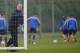 ST ALBANS, ENGLAND - MARCH 10: Arsenal manager Arsene Wenger moves the goalposts during the Arsenal training session at London Colney on March 10, 2014 in St Albans, England. (Photo by Michael Regan/Getty Images)